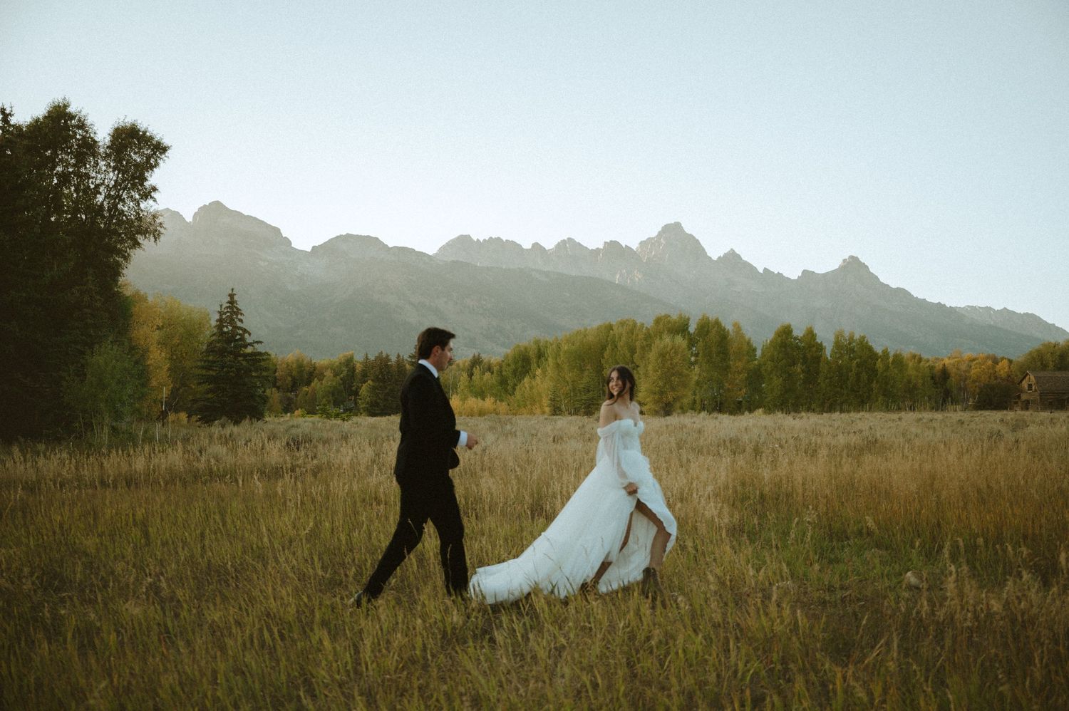 Candid and timeless wedding photo of a couple at Grand Teton National Park in Jackson Hole, Wyoming.