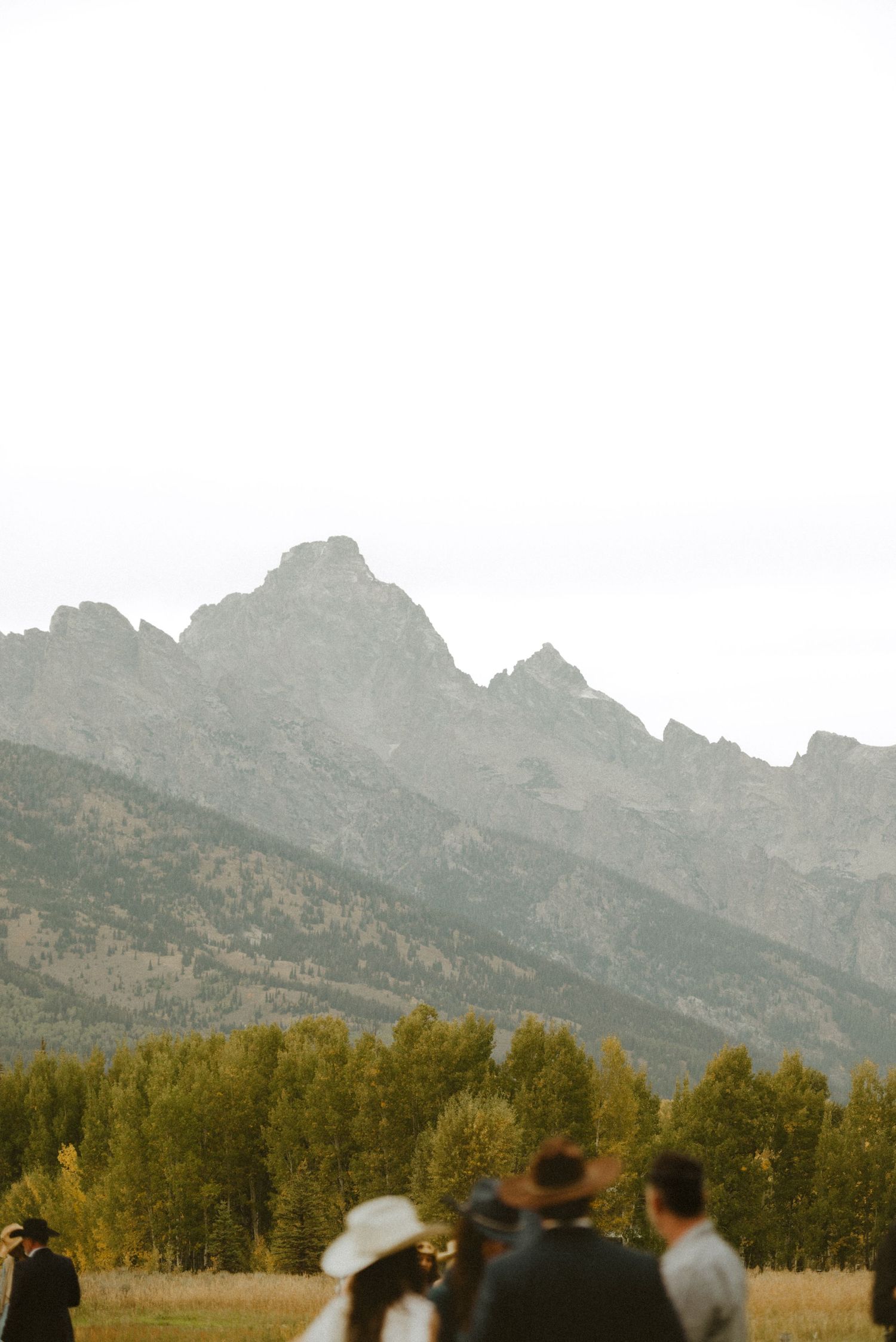 Candid and timeless wedding photo of a couple at Grand Teton National Park in Jackson Hole, Wyoming.