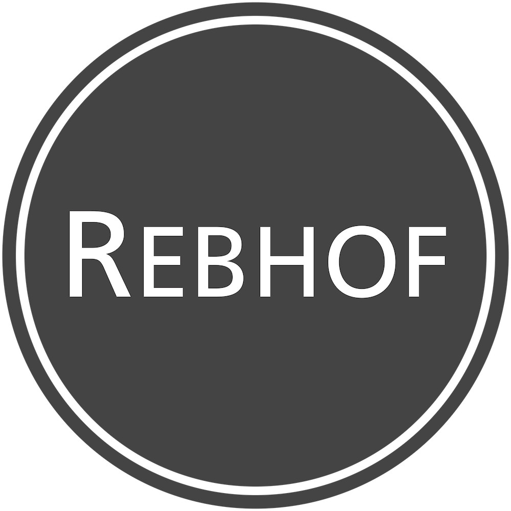 Circular dark gray logo design featuring the text 'REBHOF' in white capital letters within a double-ringed border.