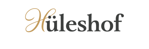 Elegant gold and black Huleshof logo design with stylized calligraphic lettering on white background.