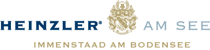 Heinzler am See hotel logo with gold crest, located in Immenstaad am Bodensee, Germany.