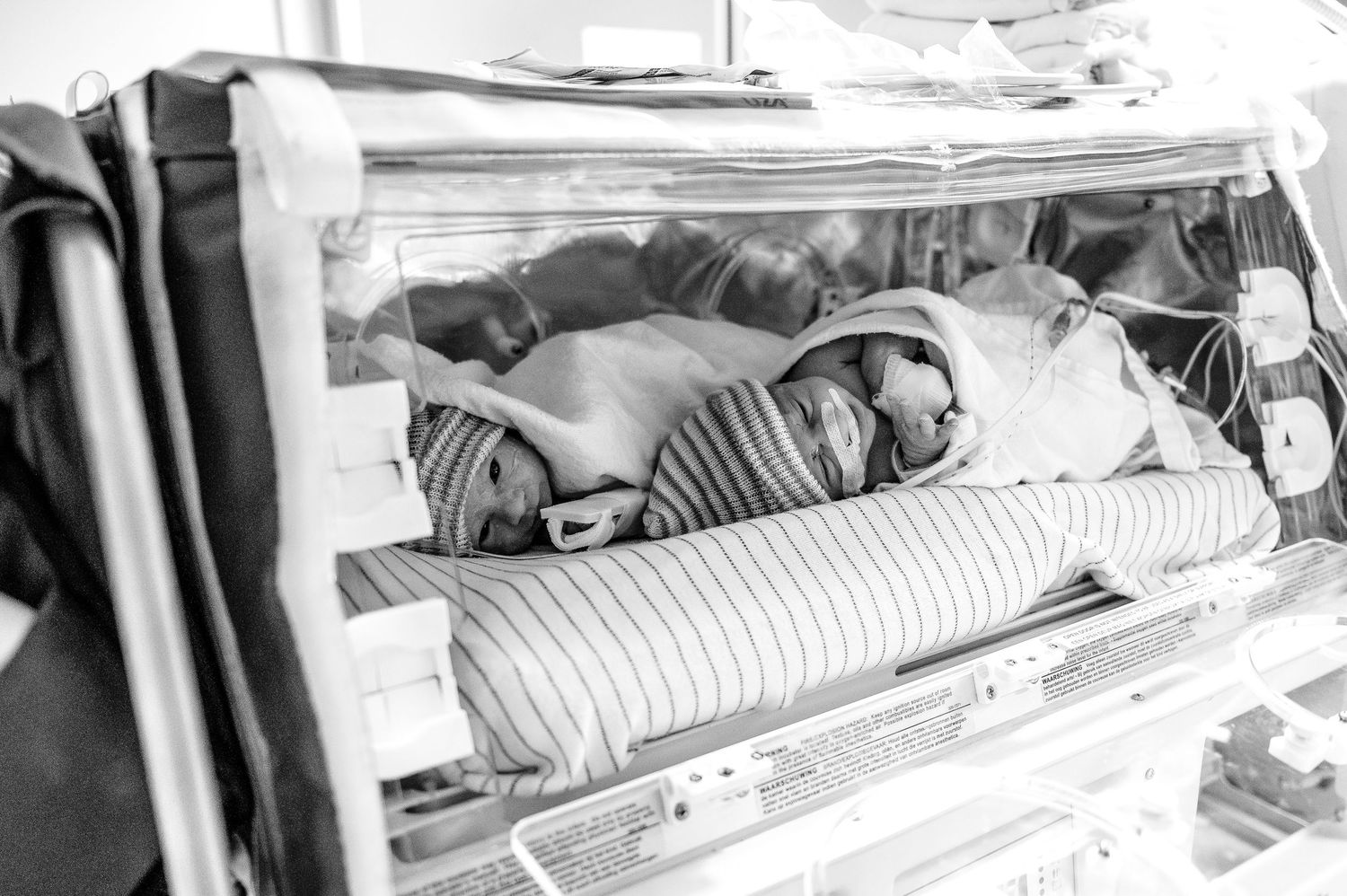 A collection of black and white photos showing passengers sleeping on train berths in vintage rail cars.