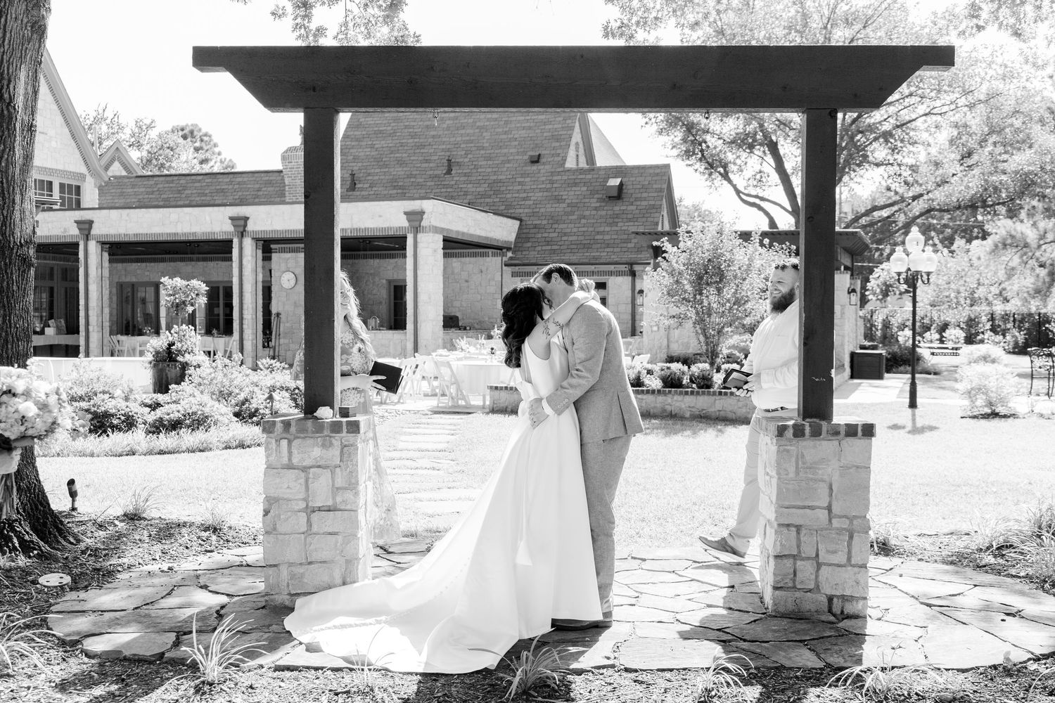 Black and White first kiss photo captured by luxury Austin Tx Photographer