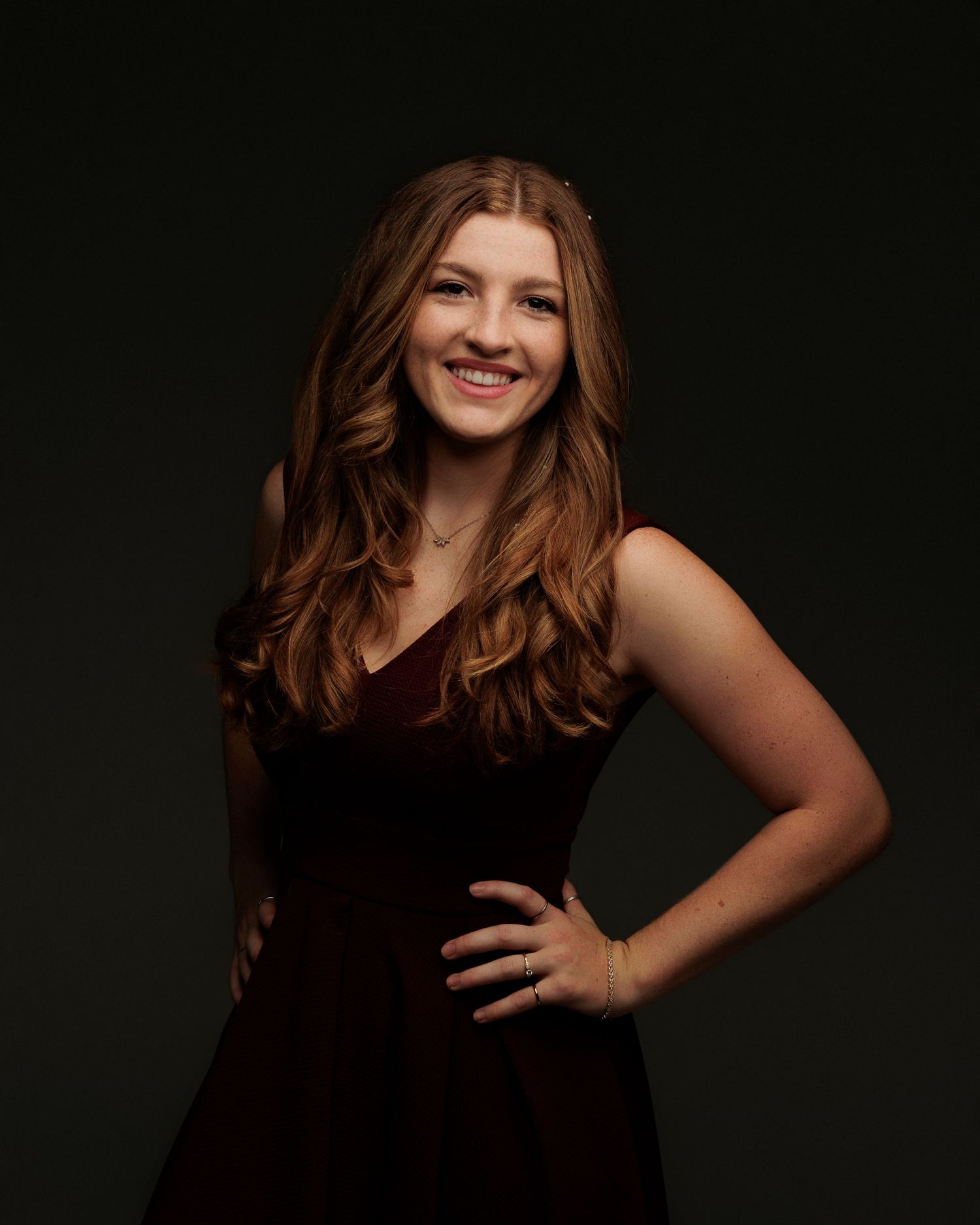 Professional headshot of Chloe Storm, owner of Chloe Storm Photo, specializing in romantic Hill Country weddings and engagements.