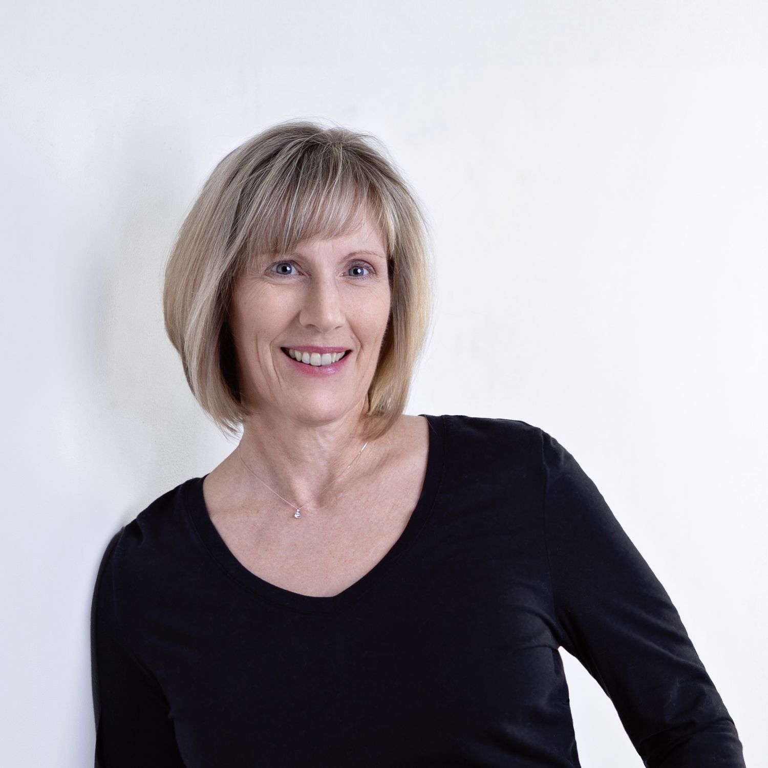 Headshot of Winnipeg professional photographer Ann Poole Creations