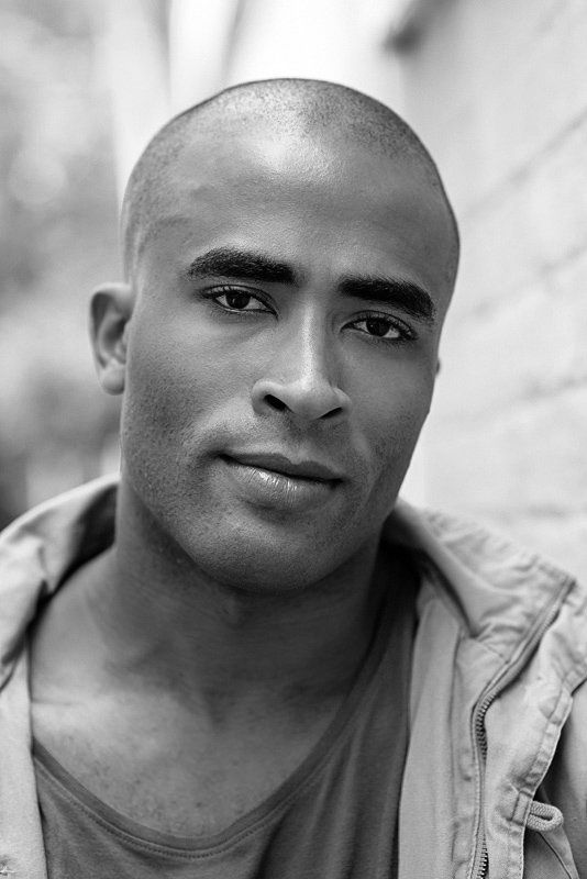 Series of black and white portraits showing various expressions in natural lighting.
