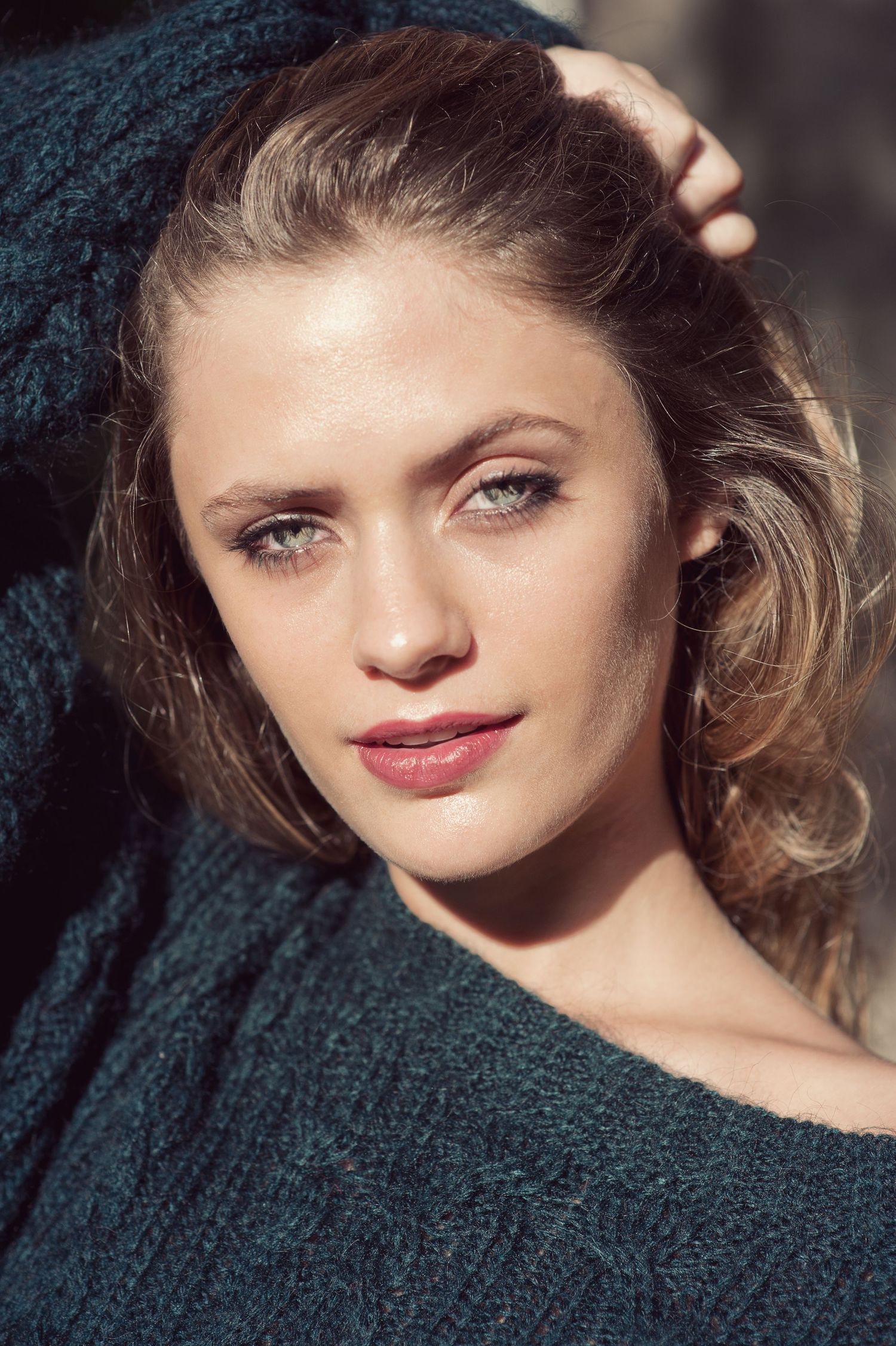 Close-up beauty portraits with dramatic lighting and soft focus.
