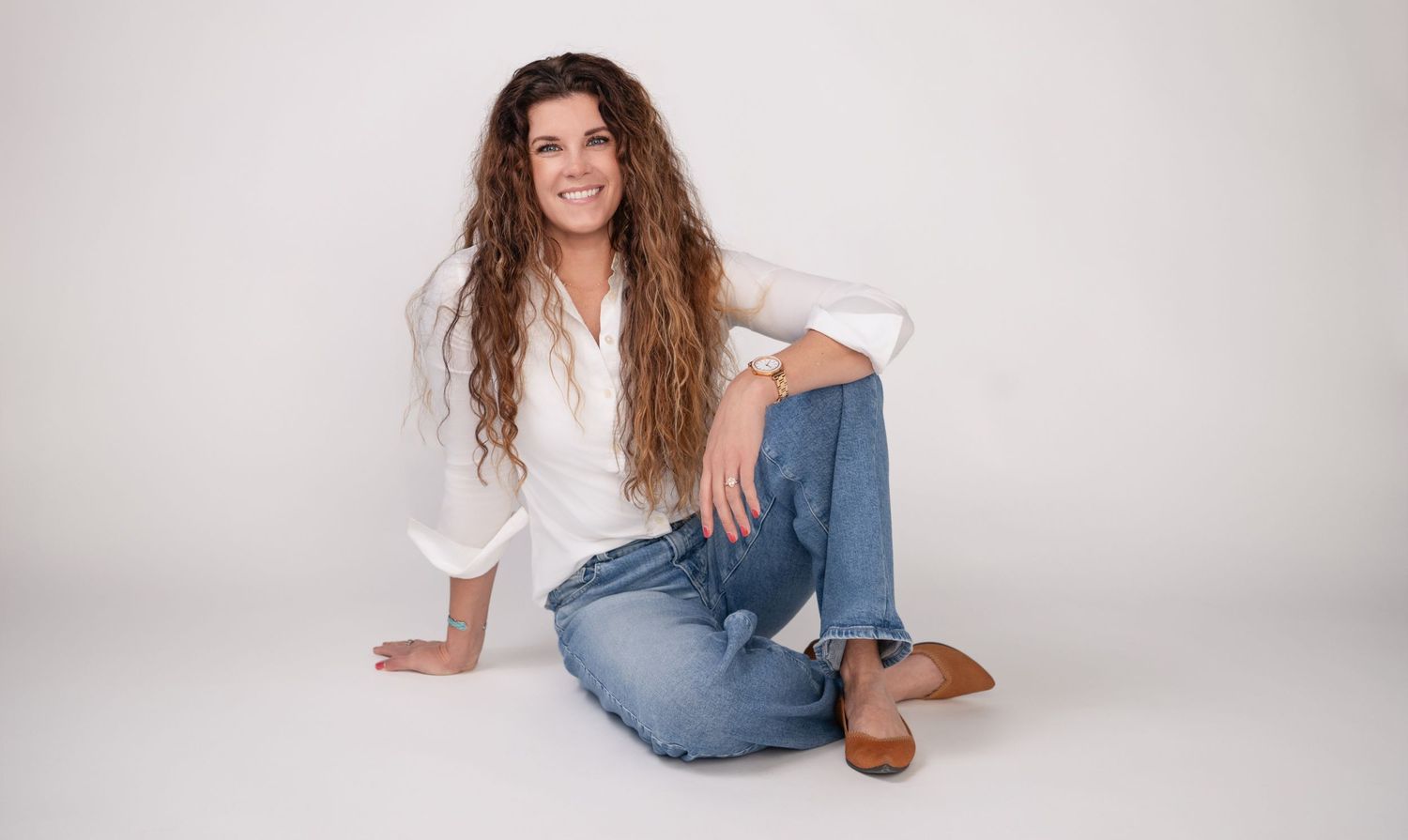 Casual lifestyle Branding Portraits of someone in white shirt and jeans on white background.