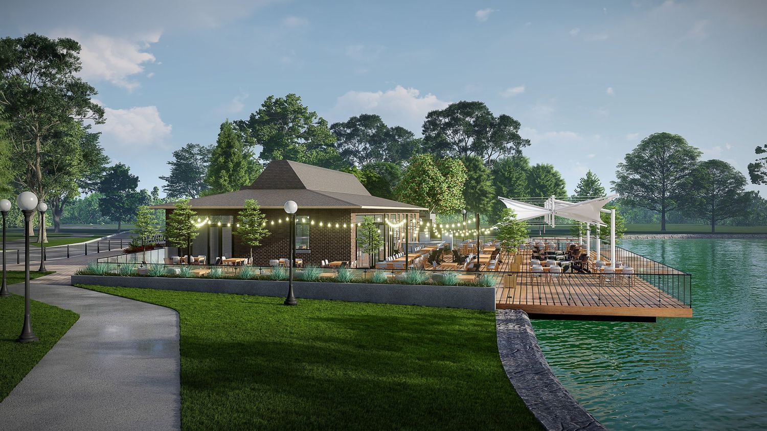 Panoramic view of a lakeside park with tennis courts, walking paths, and recreational facilities surrounded by trees.