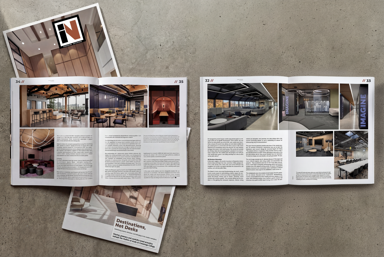 Interior design portfolio layout with multiple photo spreads and text pages displayed on concrete surface.