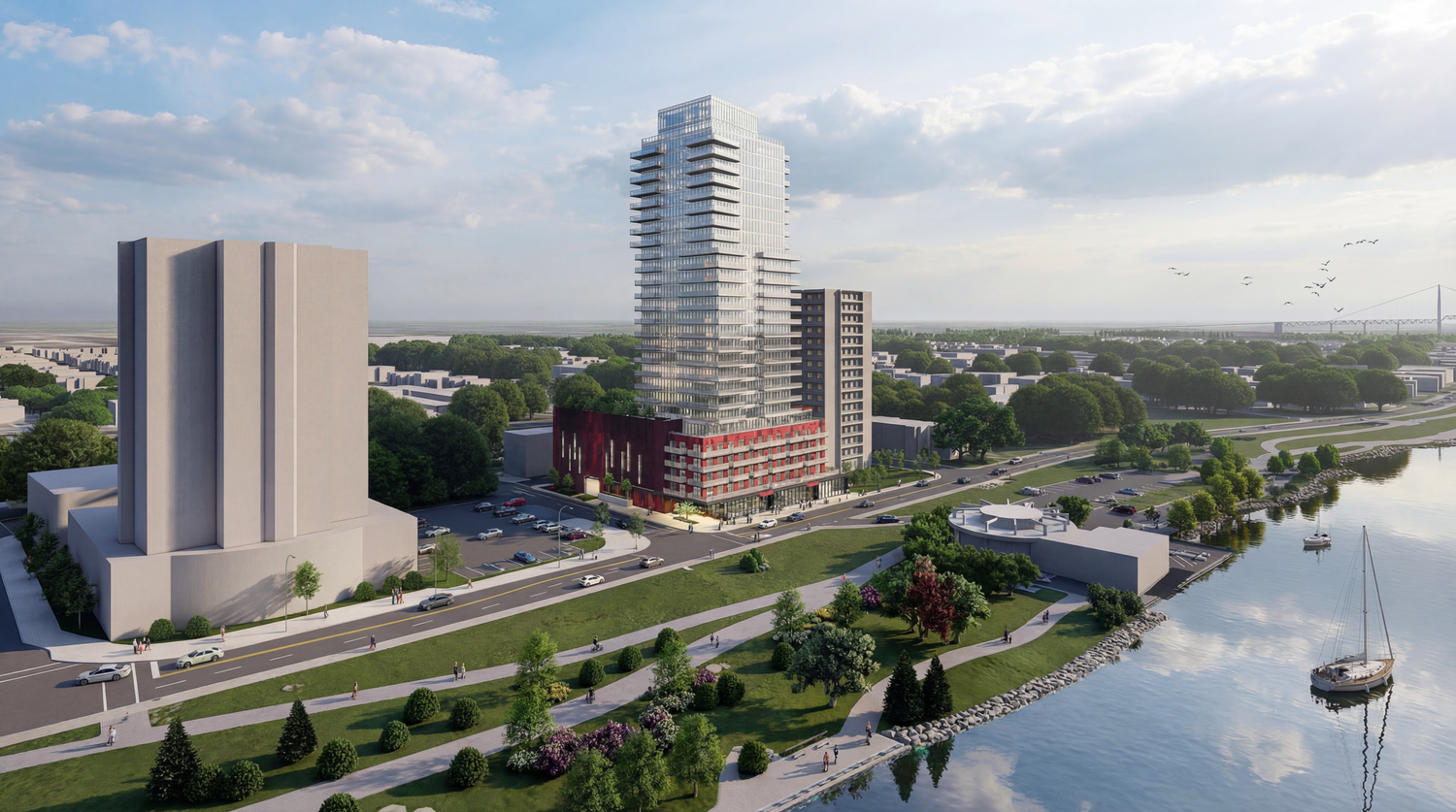 Panoramic aerial view of modern waterfront buildings and high-rise towers along a river in an urban setting.