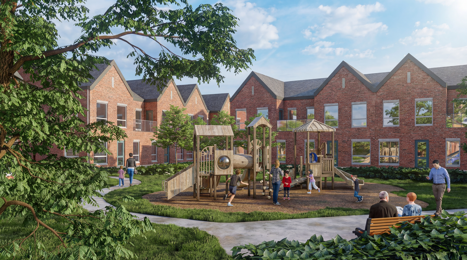 Modern townhouse development with a central playground area surrounded by brick homes and landscaped greenery.