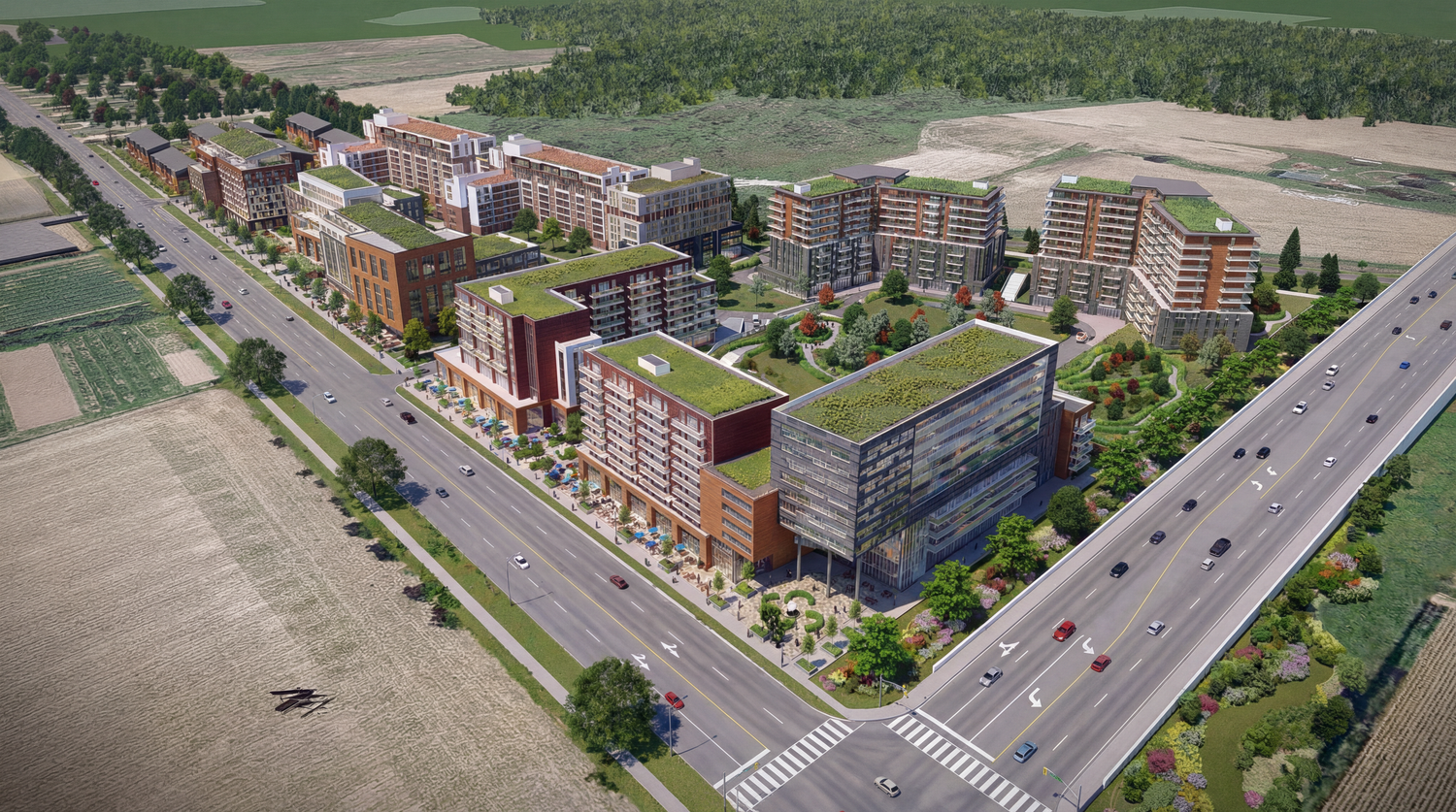 Aerial view of a large residential development with multiple apartment buildings and green spaces.