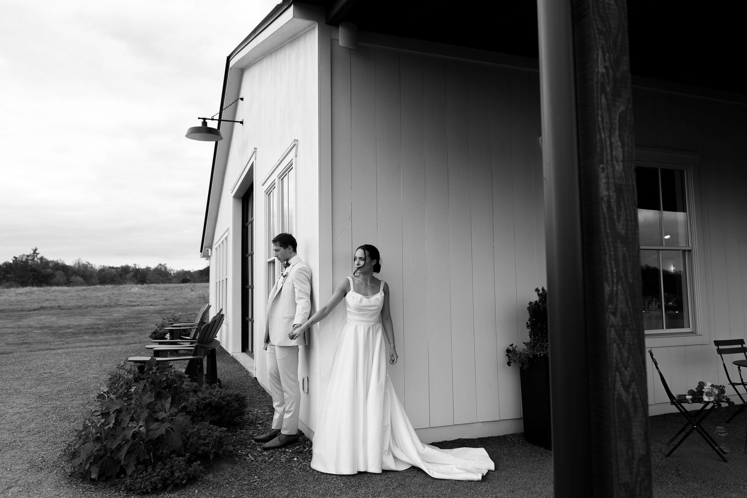 Couple’s first touch at Tiffin Farm Barn Charlottesville VA wedding photography editorial and candid style