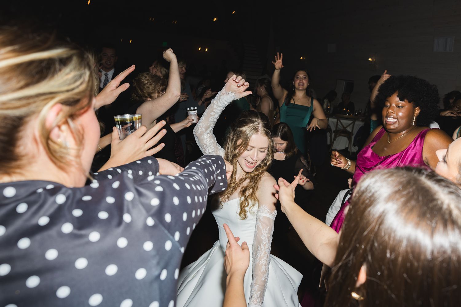 Bride and groom dancing at Wakefield Barn, Wake Forest NC, destination wedding photography, editorial documentary style