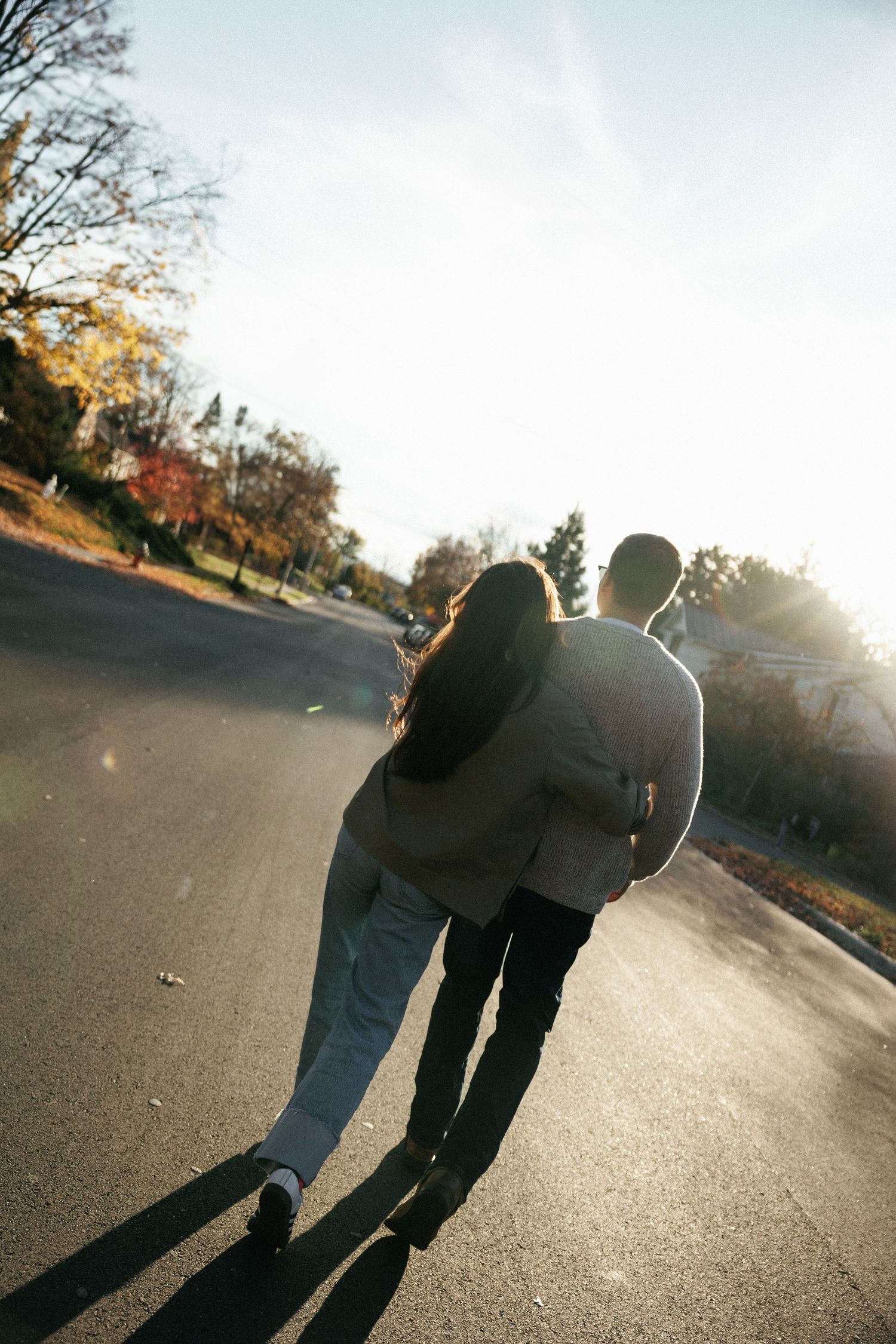 Nostalgic Film photo of couple walking through neighborhood in Harrisonburg, VA