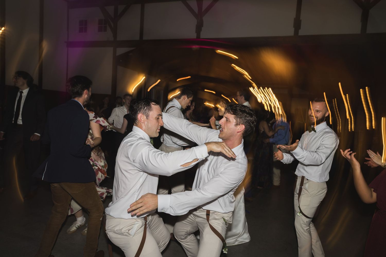 Guests dancing at Tiffin Farm Barn wedding, Charlottesville Virginia, candid and editorial wedding photography