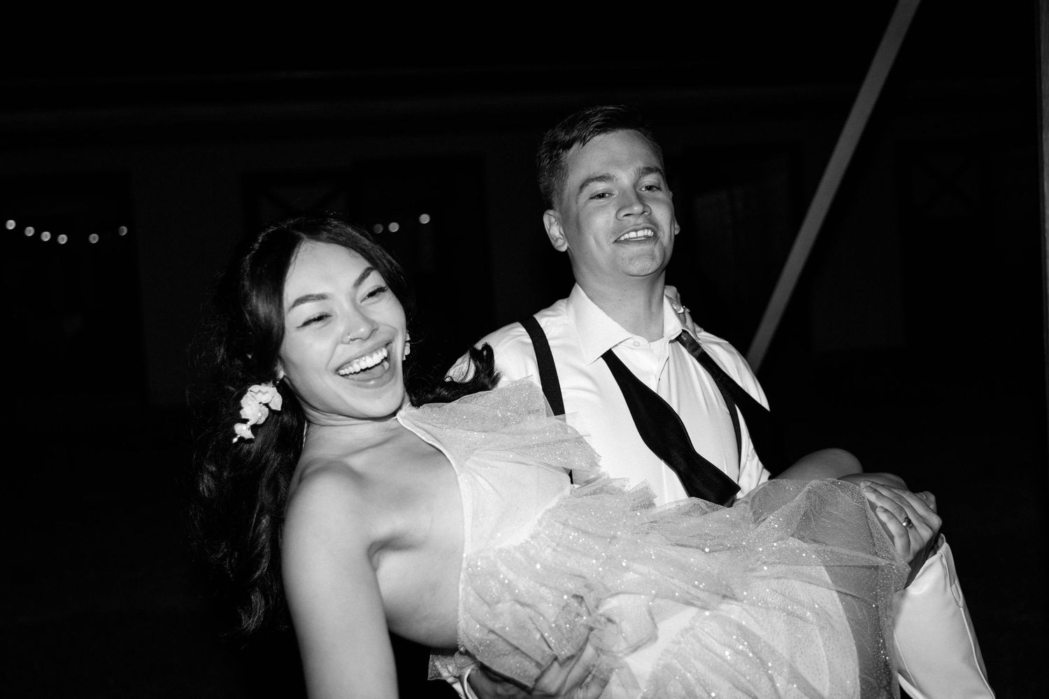 Groom carrying Bride at a modern and editorial wedding in Virginia