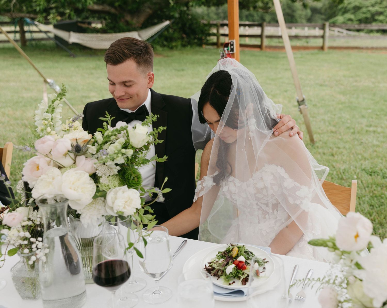 Bride and groom praying at Knights Gambit Vineyard wedding, Charlottesville VA, editorial and candid wedding photography