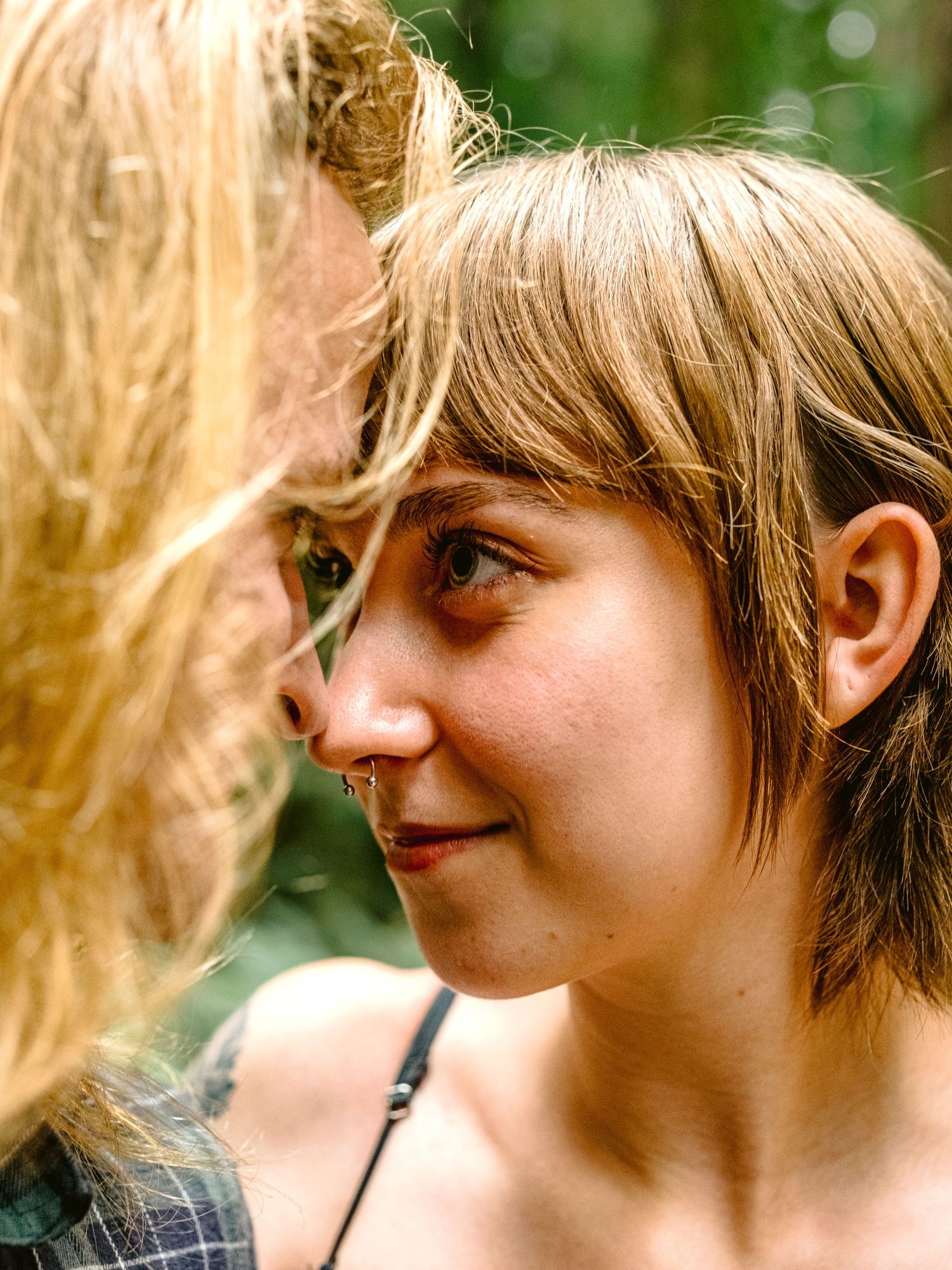 Close-up portrait series showing playful expressions and natural lighting.