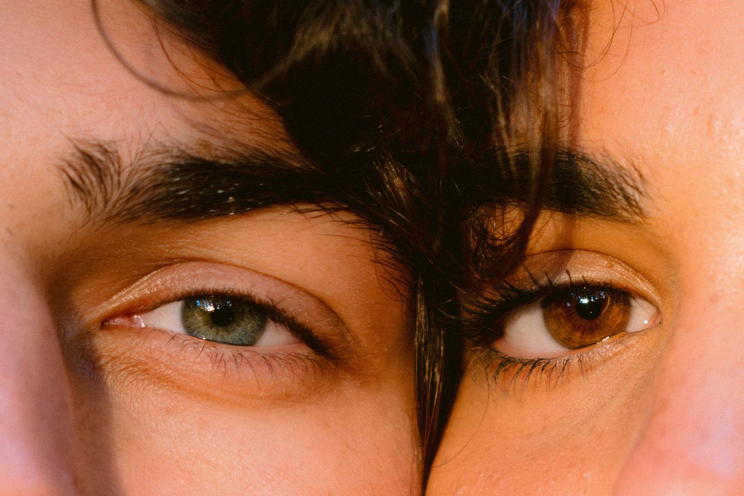 Extreme close-up sequence focusing on eyes and facial features.