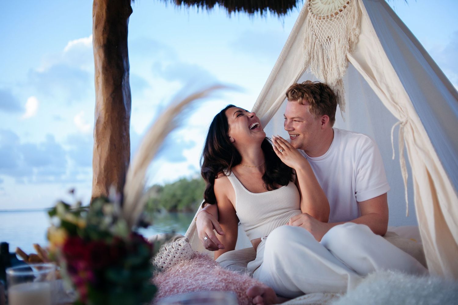 Violin serenade, sunset proposal picnic at Siankaan lagoon. Romance and joy by the water’s edge.