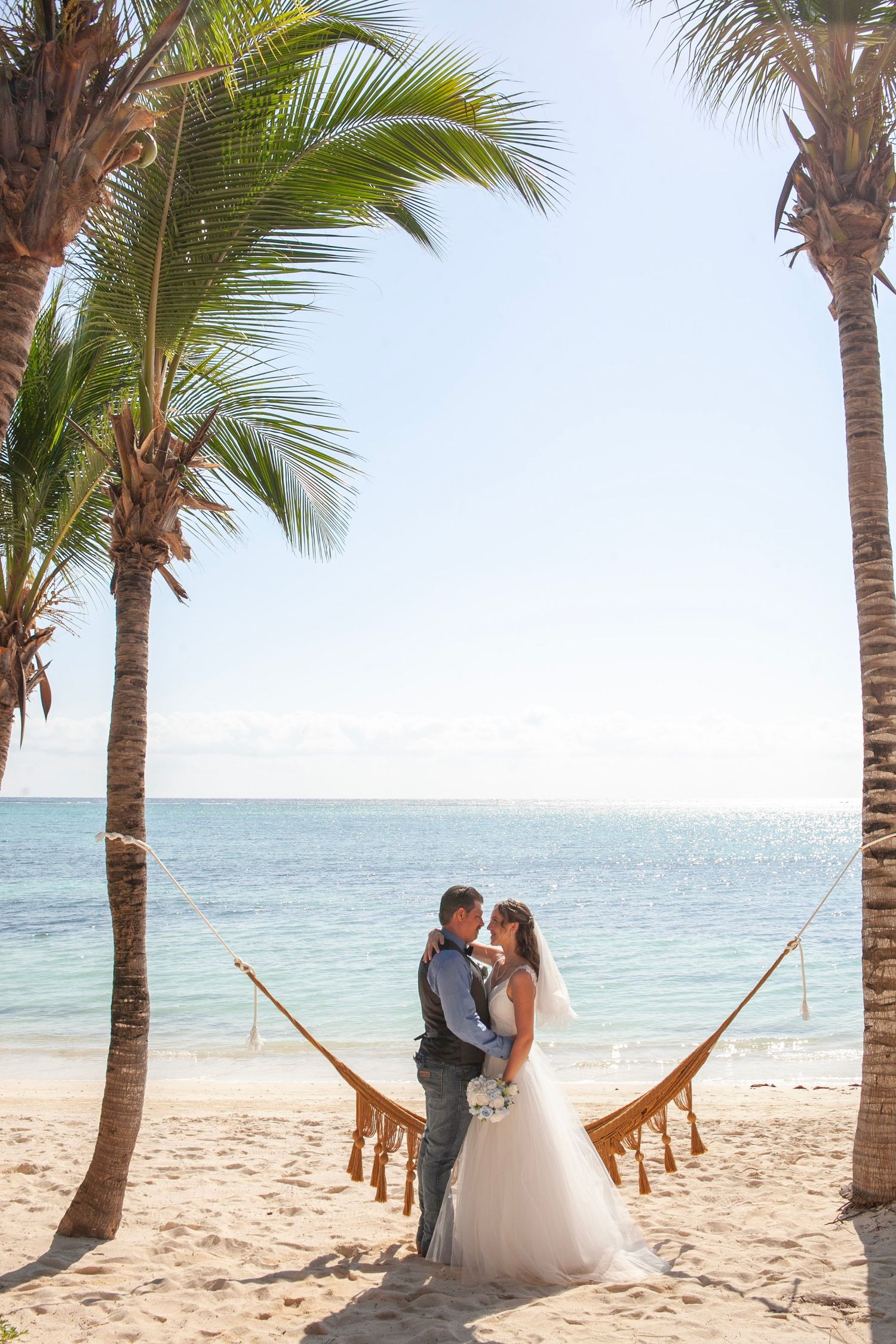 Beach wedding in Tankaah, Caleta Airbnb. A love story begins where the turquoise sea meets soft sands.