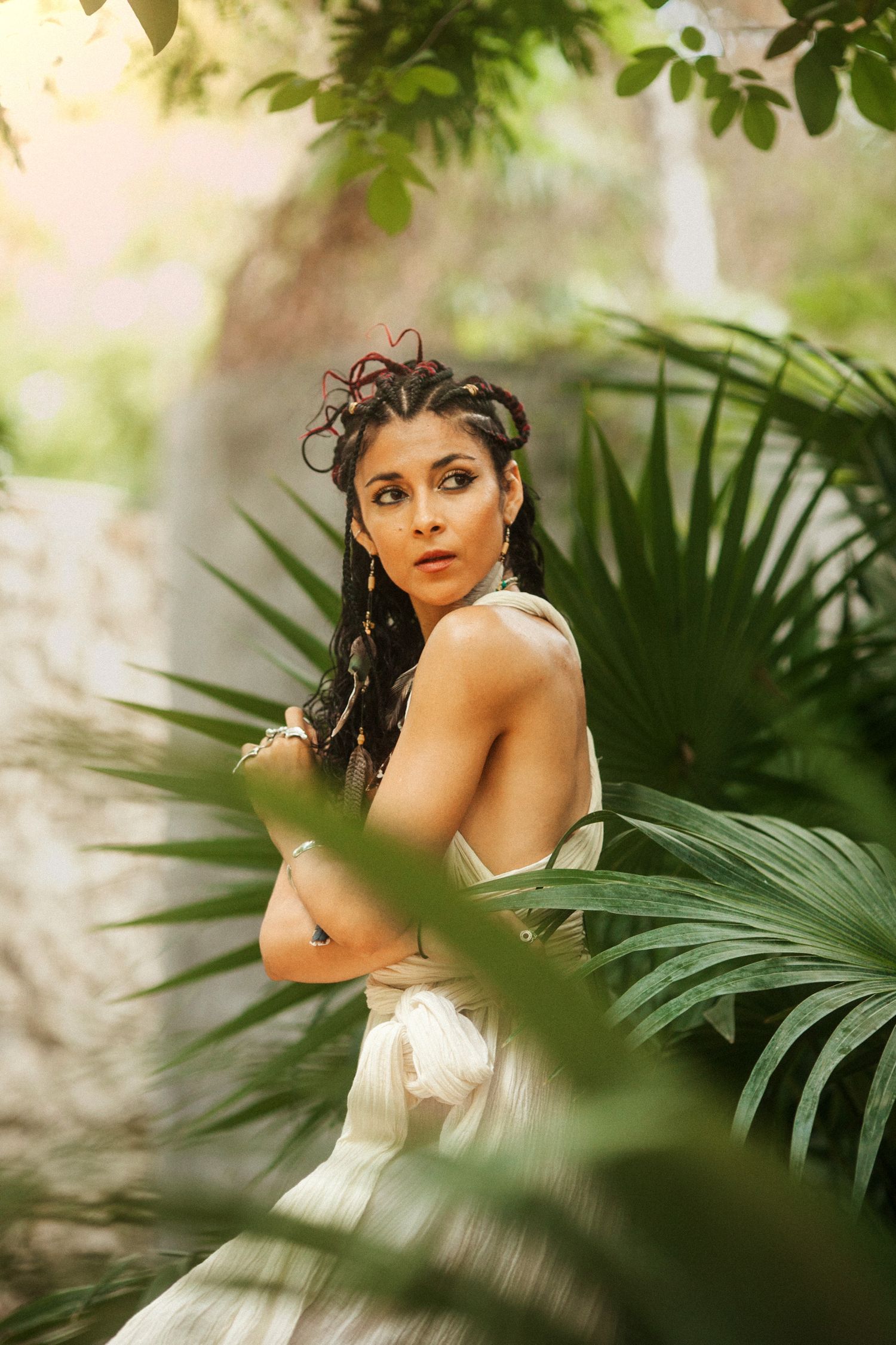 Boho model in natural light, jungle and Cenote Atik. The perfect tropical setting for style and serenity