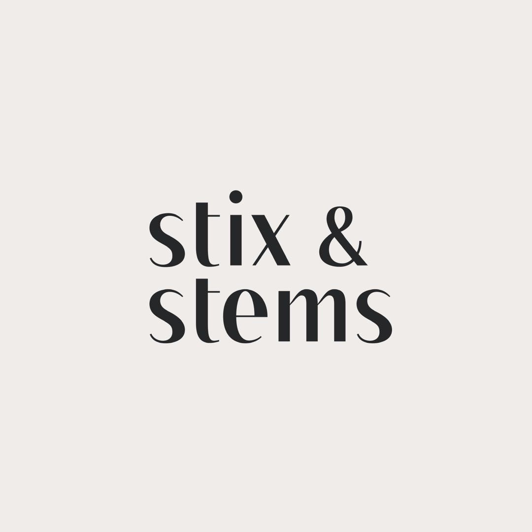 Three identical black text fragments spelling 'stix &' and 'stems' on a light gray background.