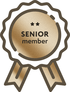 A gold and brown badge icon with two stars showing 'SENIOR member' text and decorative ribbons.