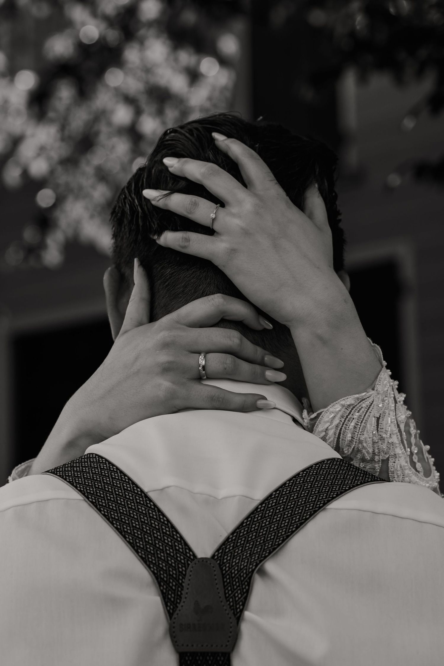 Black and white artistic photo series showing hands tenderly embracing someone's head in an intimate moment.