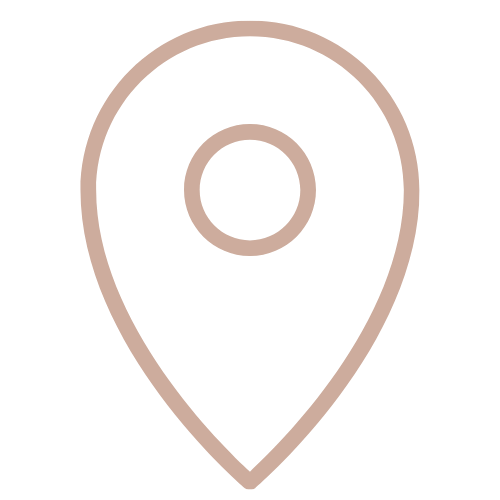 Minimalist location pin icon with circle center in soft rose gold outline on white background.