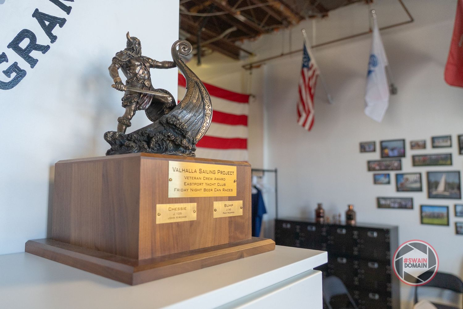 Military museum interior with display cases, flags, and patriotic memorabilia showcasing American military history.