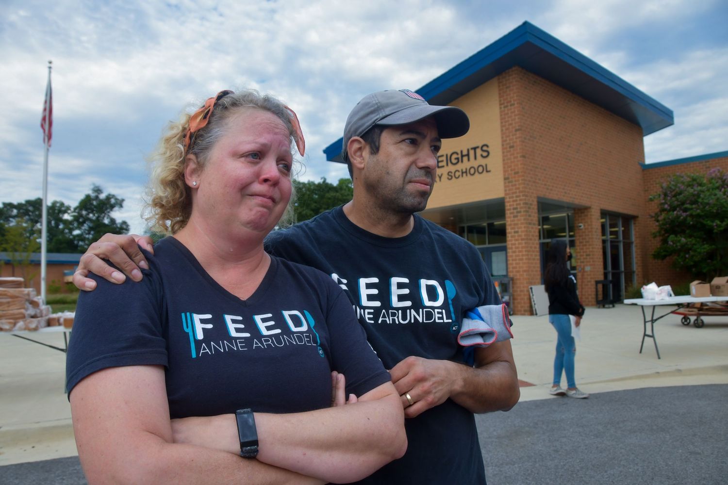 Monica Alvarado, head of Feed Anne Arundel, becomes emotional.