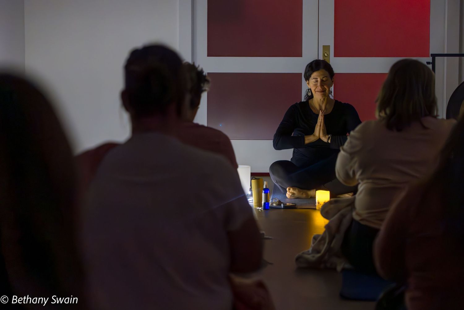 People sitting and listening to a speaker during an Emotional Fitness Studio event.