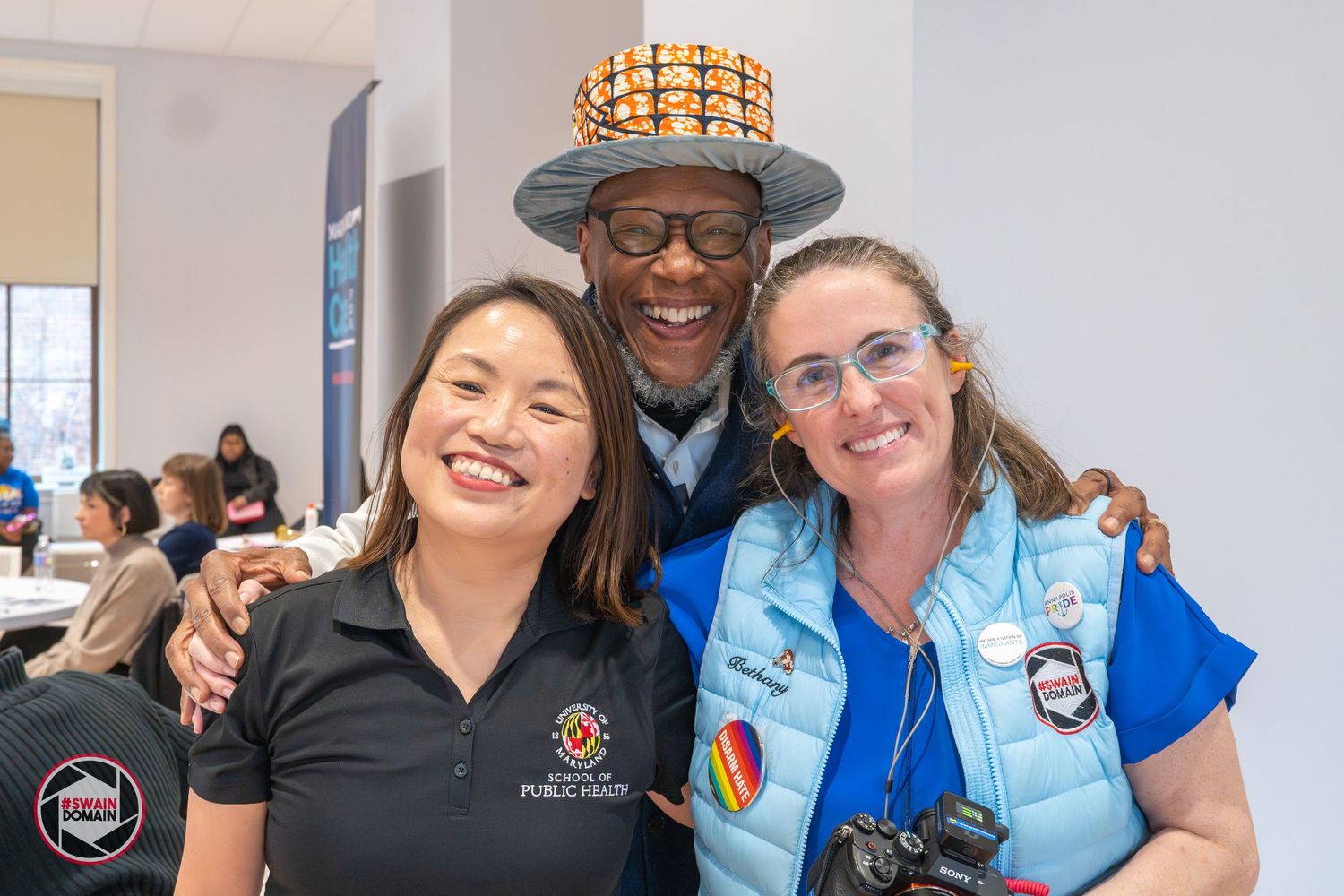 Bethany Swain poses with Dr. Jia Chen and Dr. Stephen Thomas at a Health & Wellness Festival in the Thurgood Marshall Amenity Center.