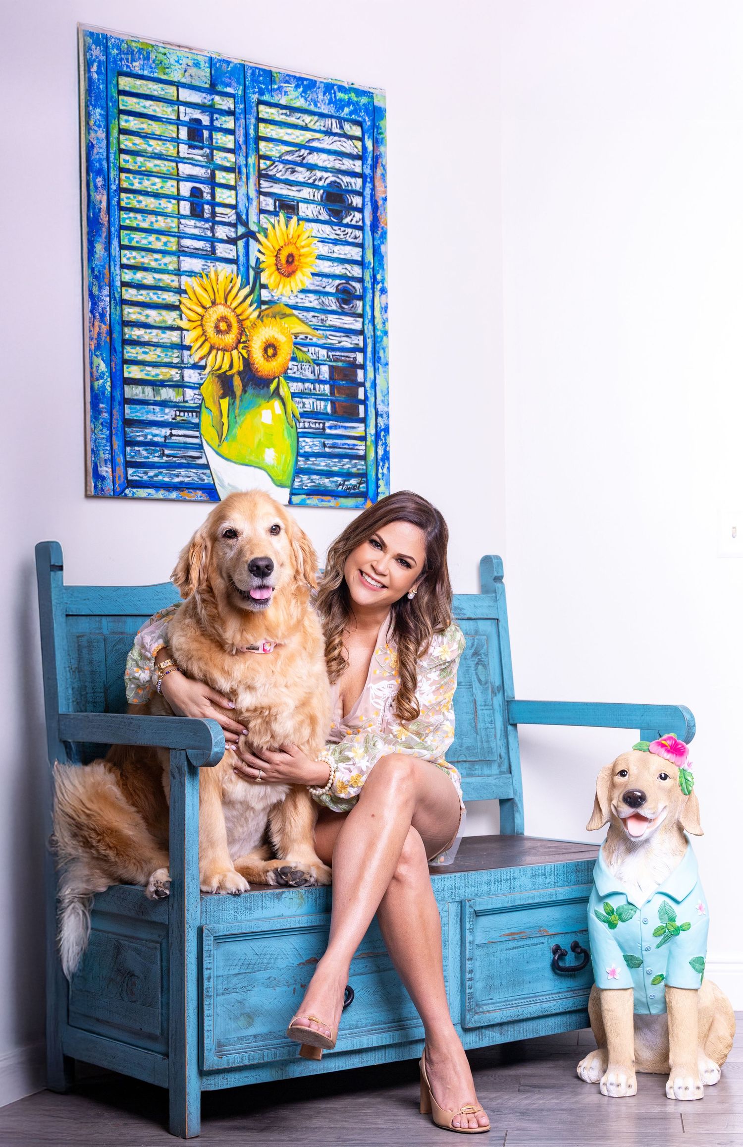 Four sequential photos show a person and golden retriever posing together on a bright blue wooden bench.