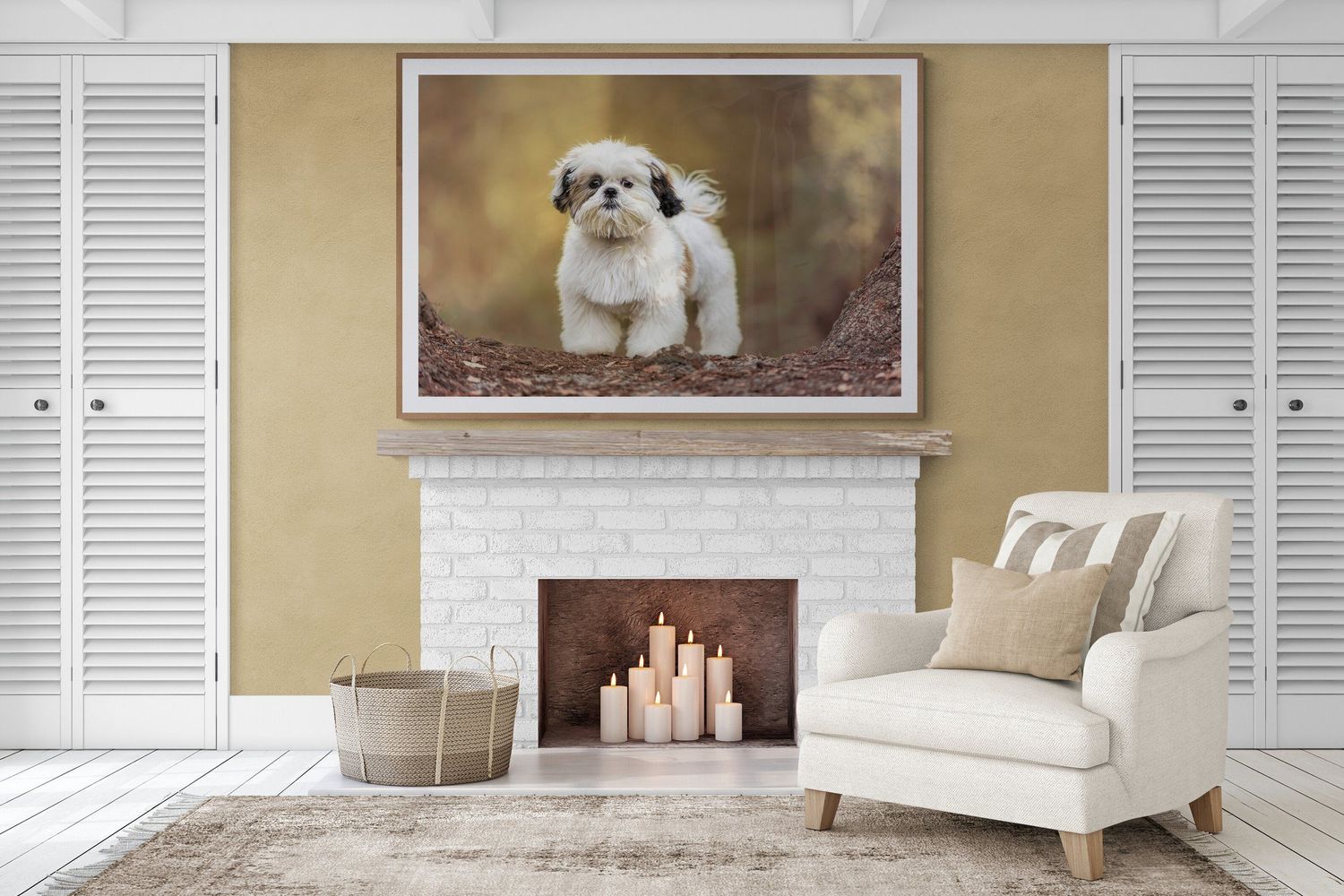 Large puppy portrait hanging above white fireplace in elegant modern living room interior.