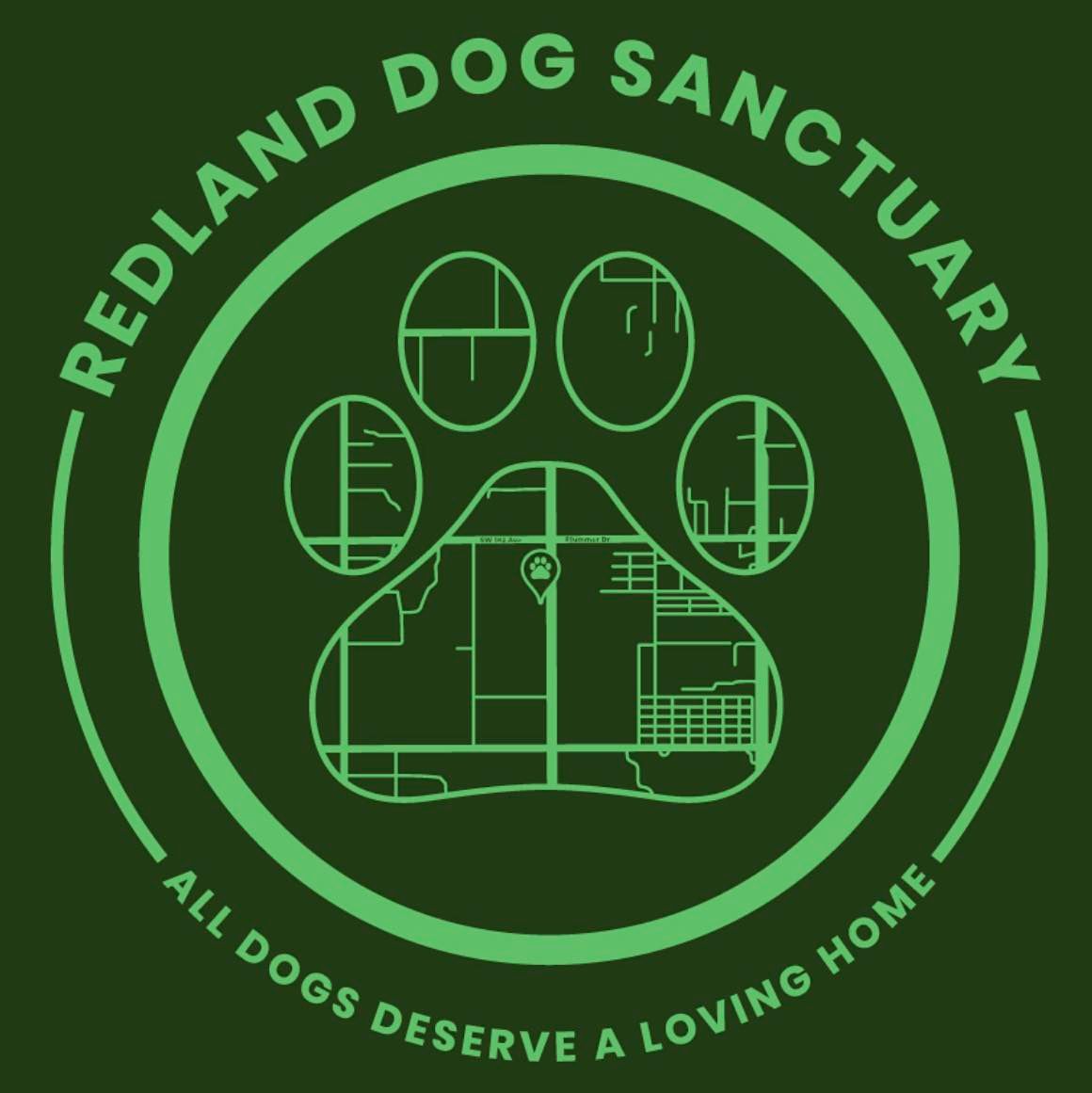 Green circular logo for Redland Dog Sanctuary featuring a paw print with architectural elements inside.