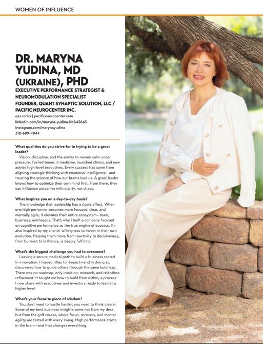 A magazine article featuring a professional photograph of a medical professional in white attire seated on stone landscaping.