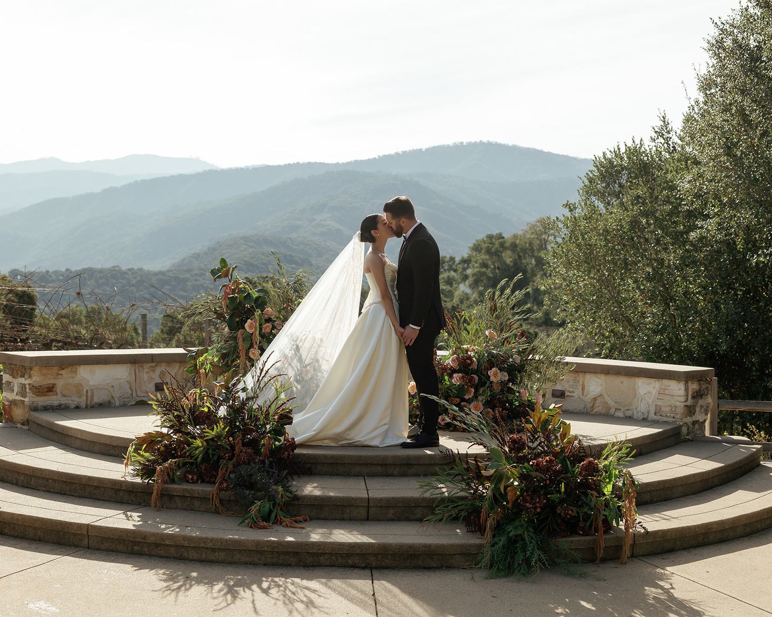 Elegant Holman Ranch wedding reception in Carmel Valley featuring refined design, warm California tones, and outdoor vineyard ambiance