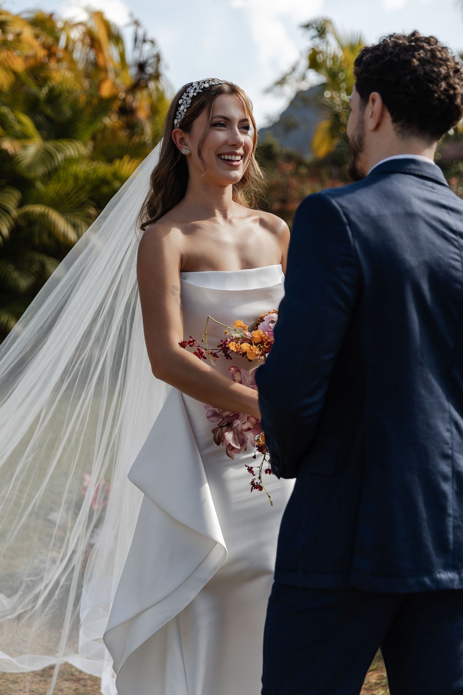 A series of wedding photos showing a couple sharing joyful moments against an autumn outdoor backdrop.