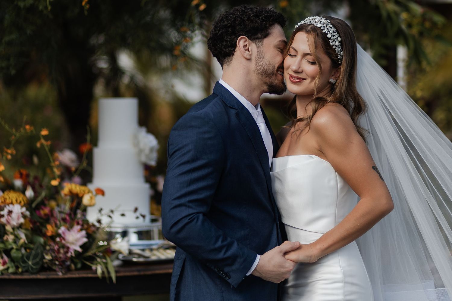 A series of tender wedding photographs showing a couple embracing during their outdoor ceremony in natural light.