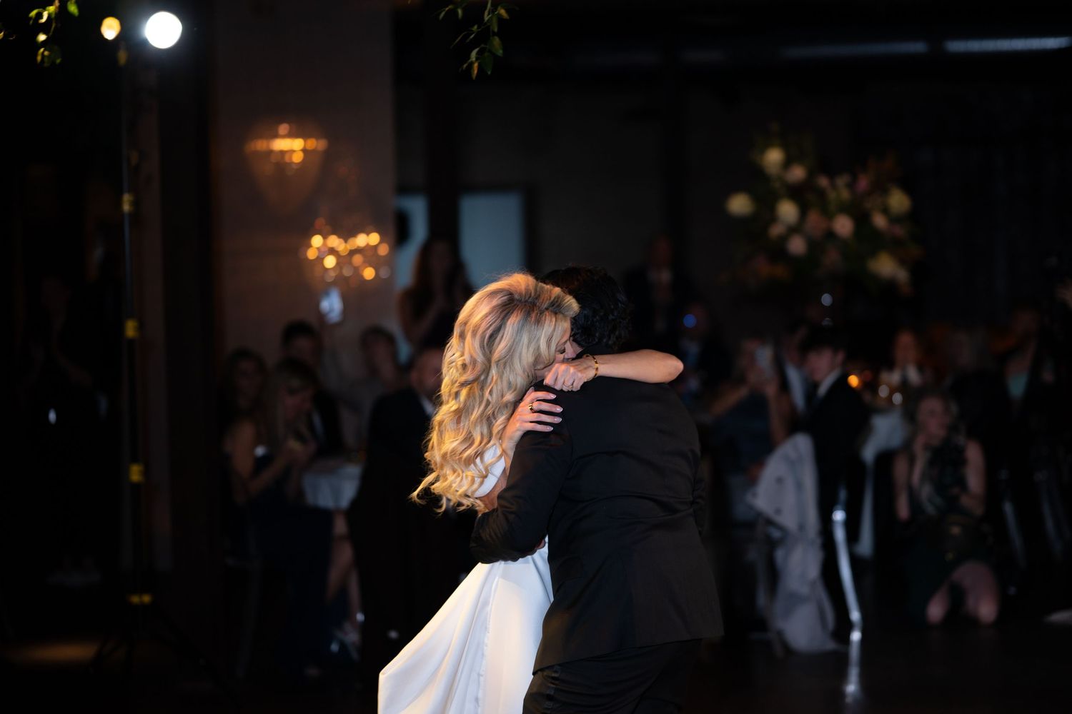 A sequence of dance floor photos showing people enjoying a lively celebration at a dimly lit evening event.