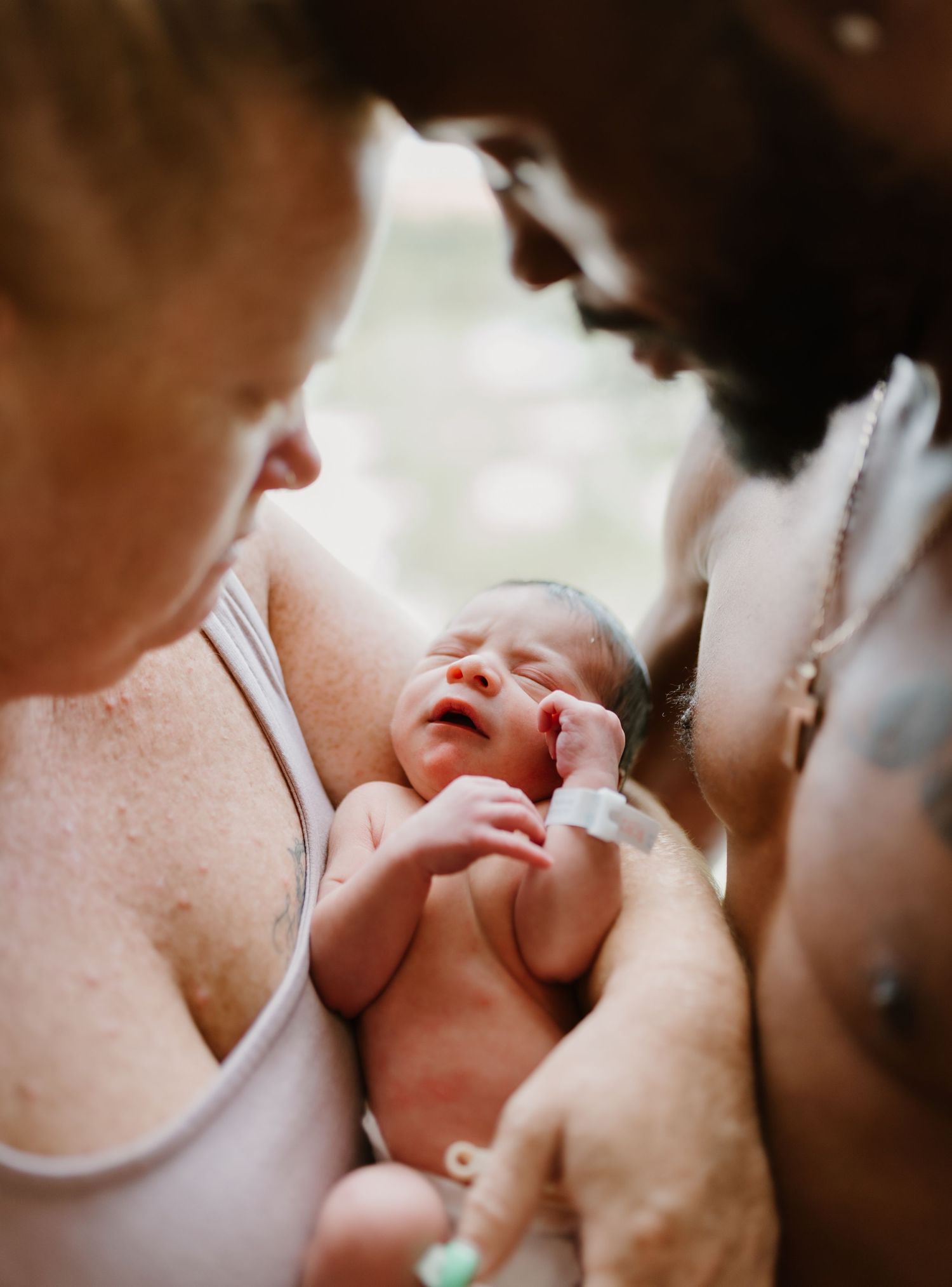 A touching close-up sequence showing gentle moments with a newborn baby.