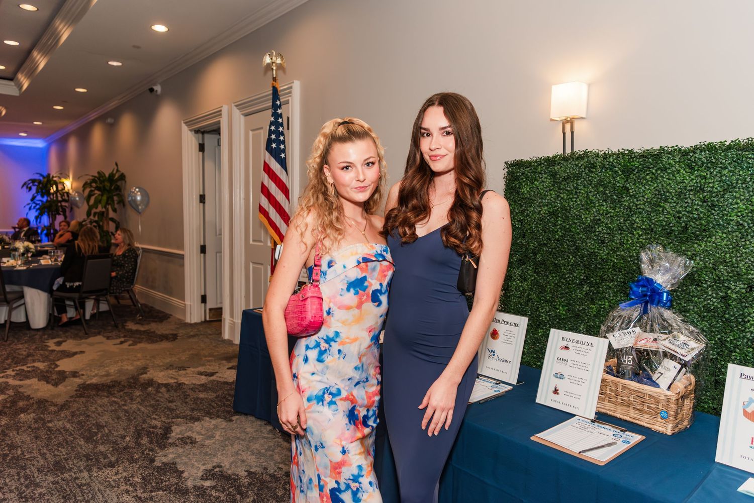 A collage of event photos showing people at a formal gathering with American flags and decorative backgrounds.