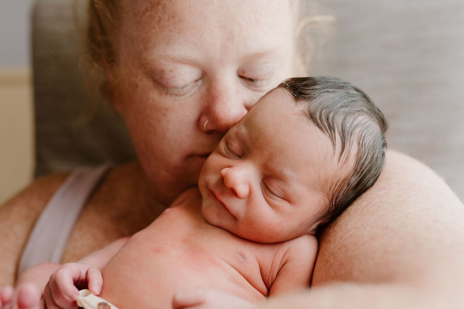 A tender moment of affection with a newborn in a sweet collage of six photos.