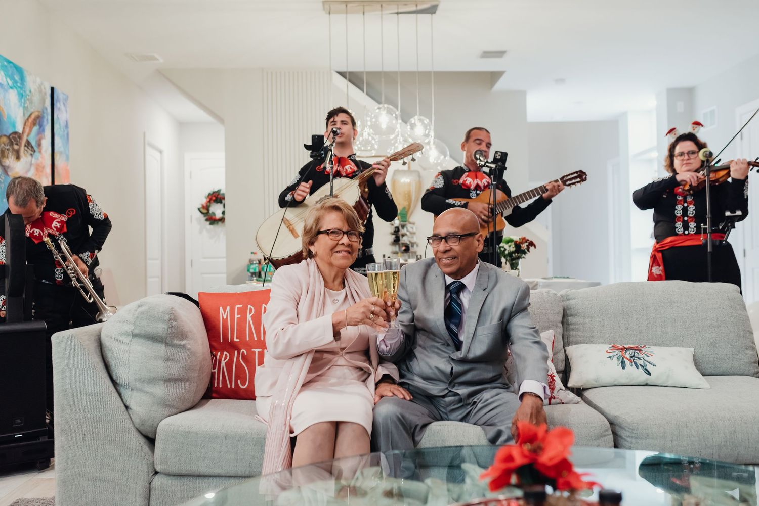 Montage of candid wedding reception moments showing guests dancing and celebrating at various points during the party.