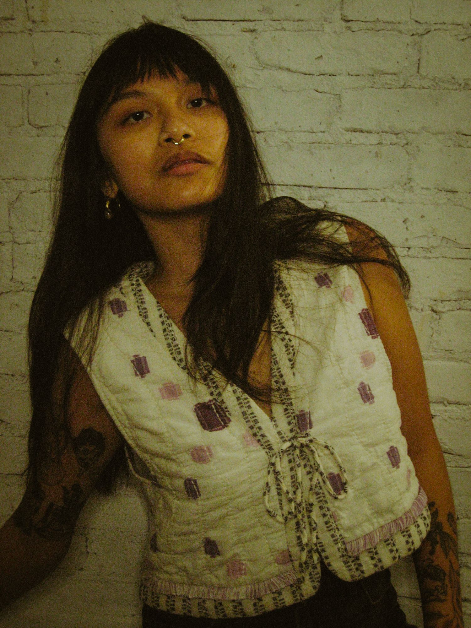 Moody editorial portrait of a young woman