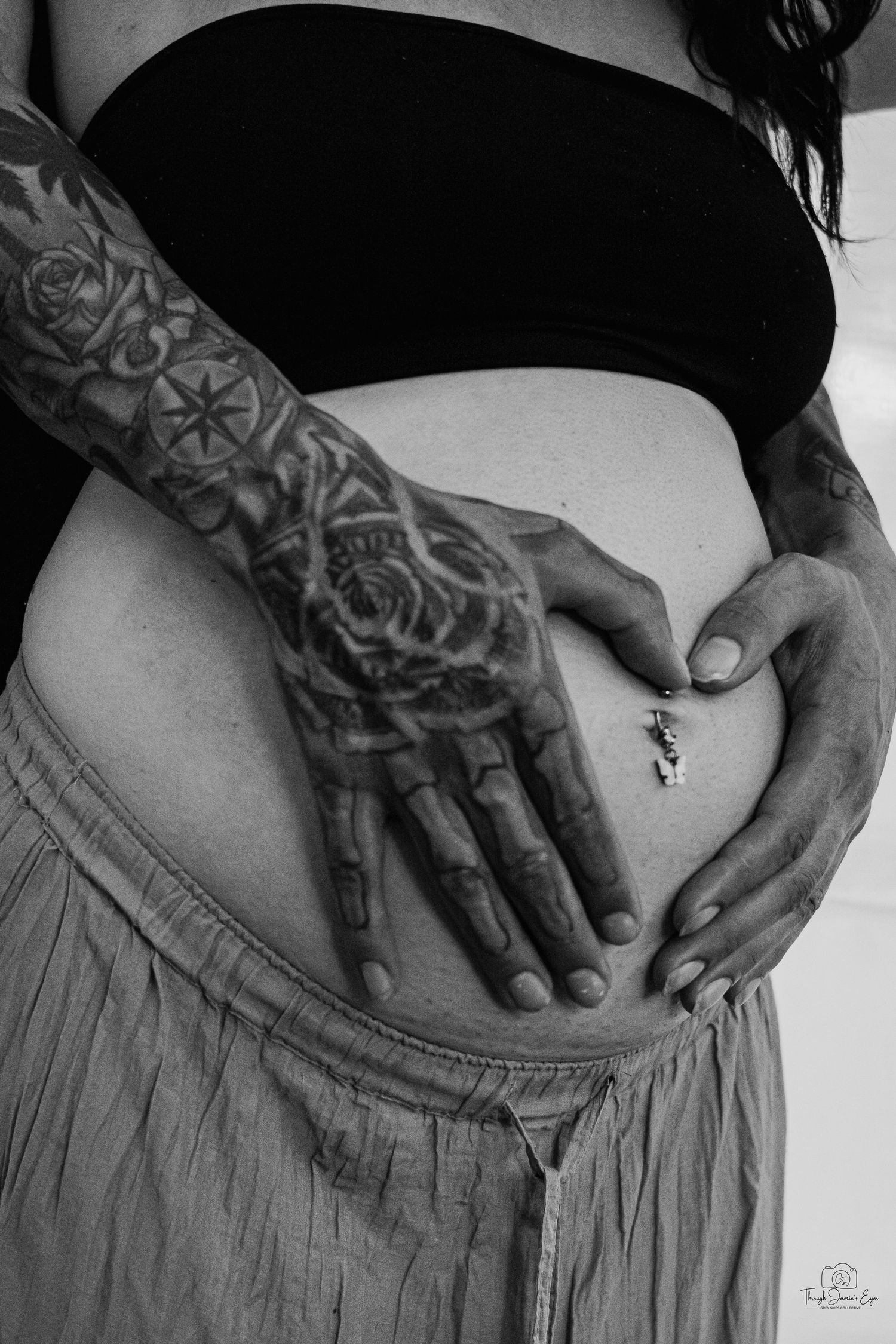 Madeline and Dsean maternity session photography portraits couples grey skies collective albums